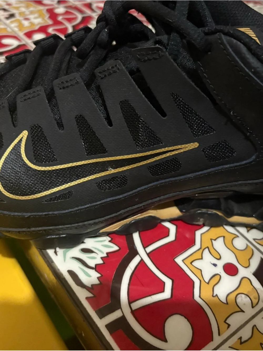 Nike Black Training Shoes with Gold Swoosh